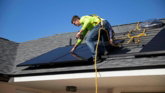 a-man-on-a-roof.jpg a man on a roof