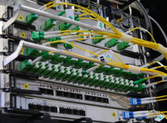 green-and-white-electric-device.jpg green and white electric device